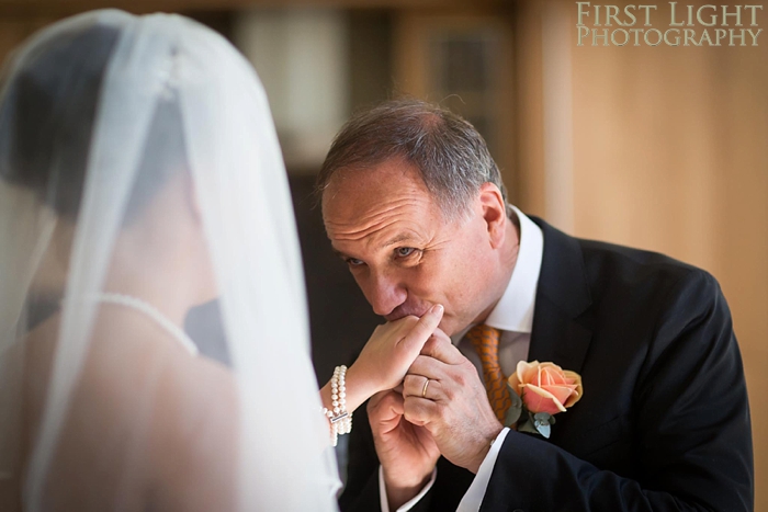 father of the bride reacts to seeing his daughter in her wedding dress