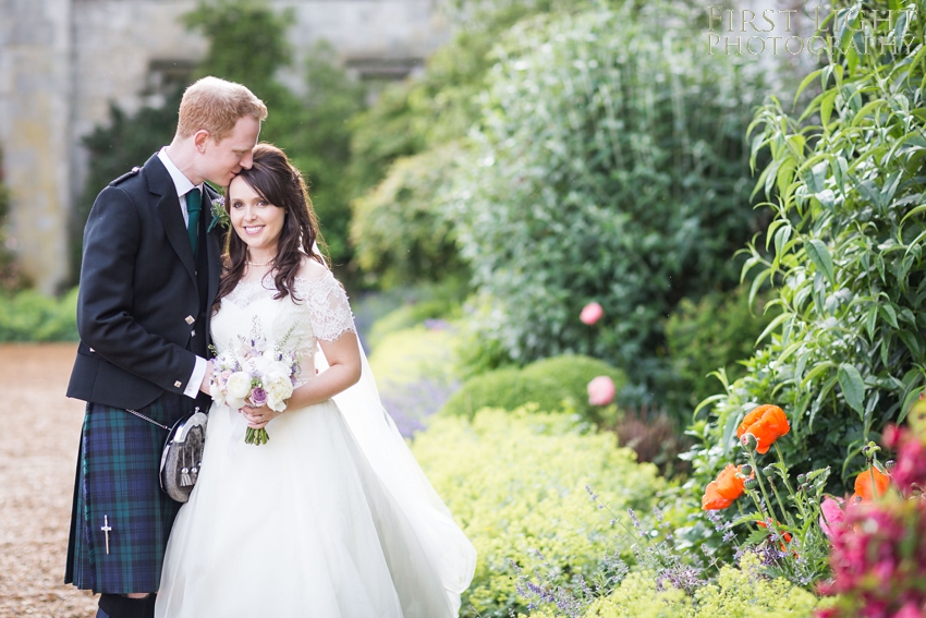 wedding couple, wedding dress, Dundas Castle wedding photography. Edinburgh wedding photography by First Light Photography