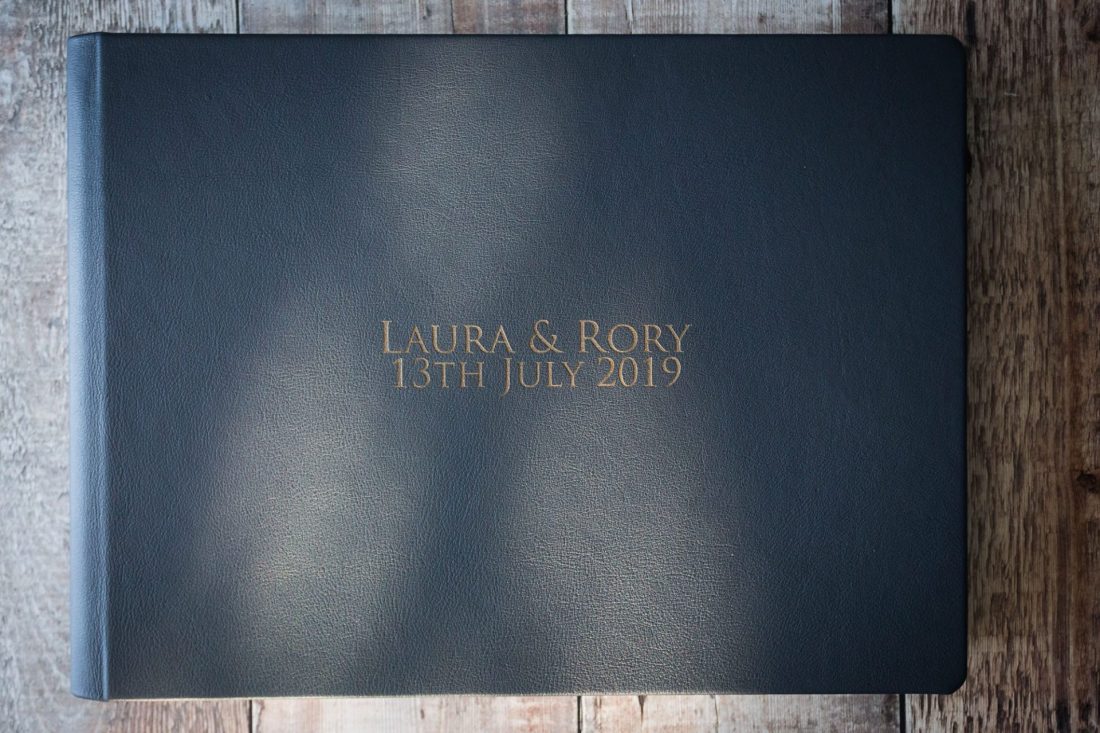 First Light wedding album cover option: distressed leather with laser etching